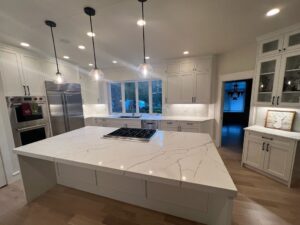 a beautiful kitchen with a granite counter top